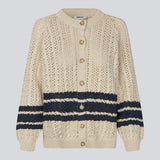 Loose knitted cardigan in beige with navy blue stripes in the button in cable knit. MetteMD cardigan is slightly see-through and has loose sleeves and a button closure. The models are 177 cm and wear a size S/36.&nbsp;
