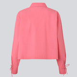Cropped shirt in cotton with a loose fit. MeyrickMD shirt has wide sleeves, a cheast pocket and cuffs with a slit and a tieband.