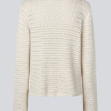 Crochet top in organic cotton. MieMD top has detailed trimmings and long wide sleeves.