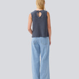 Crochet top in blue without sleeves in organic cotton. MieMD top has detailed trimmings and a deep v-neckline in the back with a tieband closure. The model is 177 cm and wears a size S/36.
