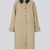Long jacket with a corduroy collar. MiraMD jacket has a hidden zipper closure in front, tree front pockets and wide sleeves with adjustable straps.