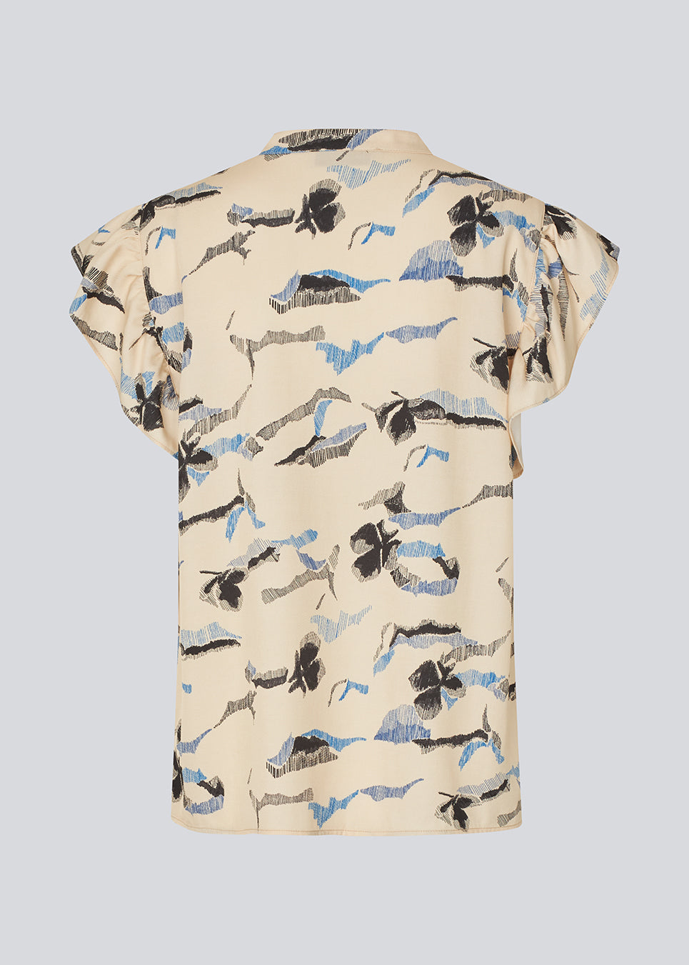 Sleeveless top with frill details. MistMD SS top has a loose fit and a button closure with frill details in front. 