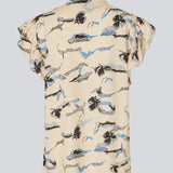 Sleeveless top with frill details. MistMD SS top has a loose fit and a button closure with frill details in front. 