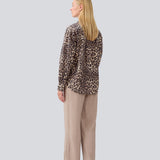 Classic shirt with an oversize fit in leo print. MoodMD print shirt has slits in the sides with tieband closure and a button closure and cheast pocket in front.