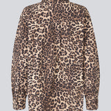 Classic shirt with an oversize fit in leo print. MoodMD print shirt has slits in the sides with tieband closure and a button closure and cheast pocket in front.