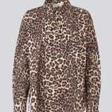Classic shirt with an oversize fit in leo print. MoodMD print shirt has slits in the sides with tieband closure and a button closure and cheast pocket in front.