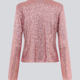 Pink cardigan with long sleeves with sequins. MulanMD cardigan has wide sleeves, is slightly cropped, and has two tiebands.