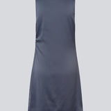 Short dress i dark blue with a waterfall detail in front. MylaMD dress is made of satin and has an invisible zipper on the side.