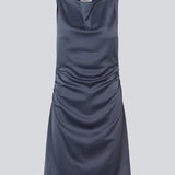 Short dress i dark blue with a waterfall detail in front. MylaMD dress is made of satin and has an invisible zipper on the side.