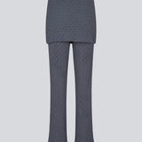 Long flared pants with a skirt. MynteMD pants is made in an elastic and structured material and has an elastic in the waist.
