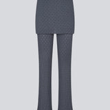 Long flared pants with a skirt. MynteMD pants is made in an elastic and structured material and has an elastic in the waist.