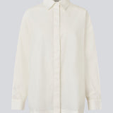 Classic shirt with an oversize fit. MyraMD shirt has a hidden buttonclosure in front and slits in the sides.