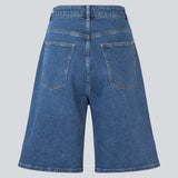 Long shorts with wide legs in cotton denim. NadjaMD solid shorts have a zipper fly, a high waist, and front and back pockets.