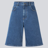 Long shorts with wide legs in cotton denim. NadjaMD solid shorts have a zipper fly, a high waist, and front and back pockets.