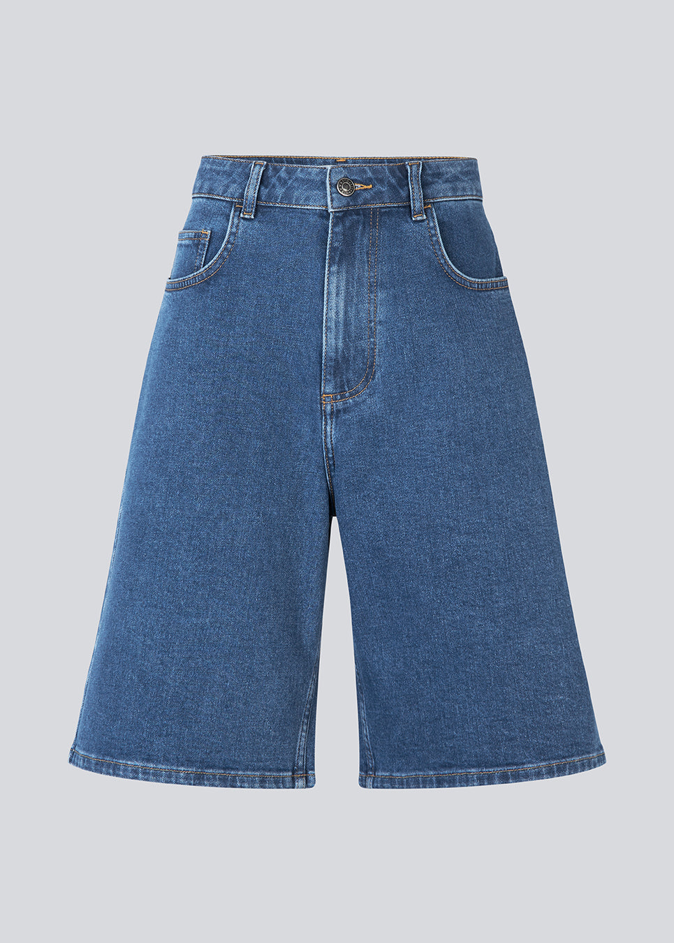 Long shorts with wide legs in cotton denim. NadjaMD solid shorts have a zipper fly, a high waist, and front and back pockets.