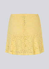 Short lace skirt in yellow wth an a-line. NamumdMD skirt has a lining and an elastic at the waist.