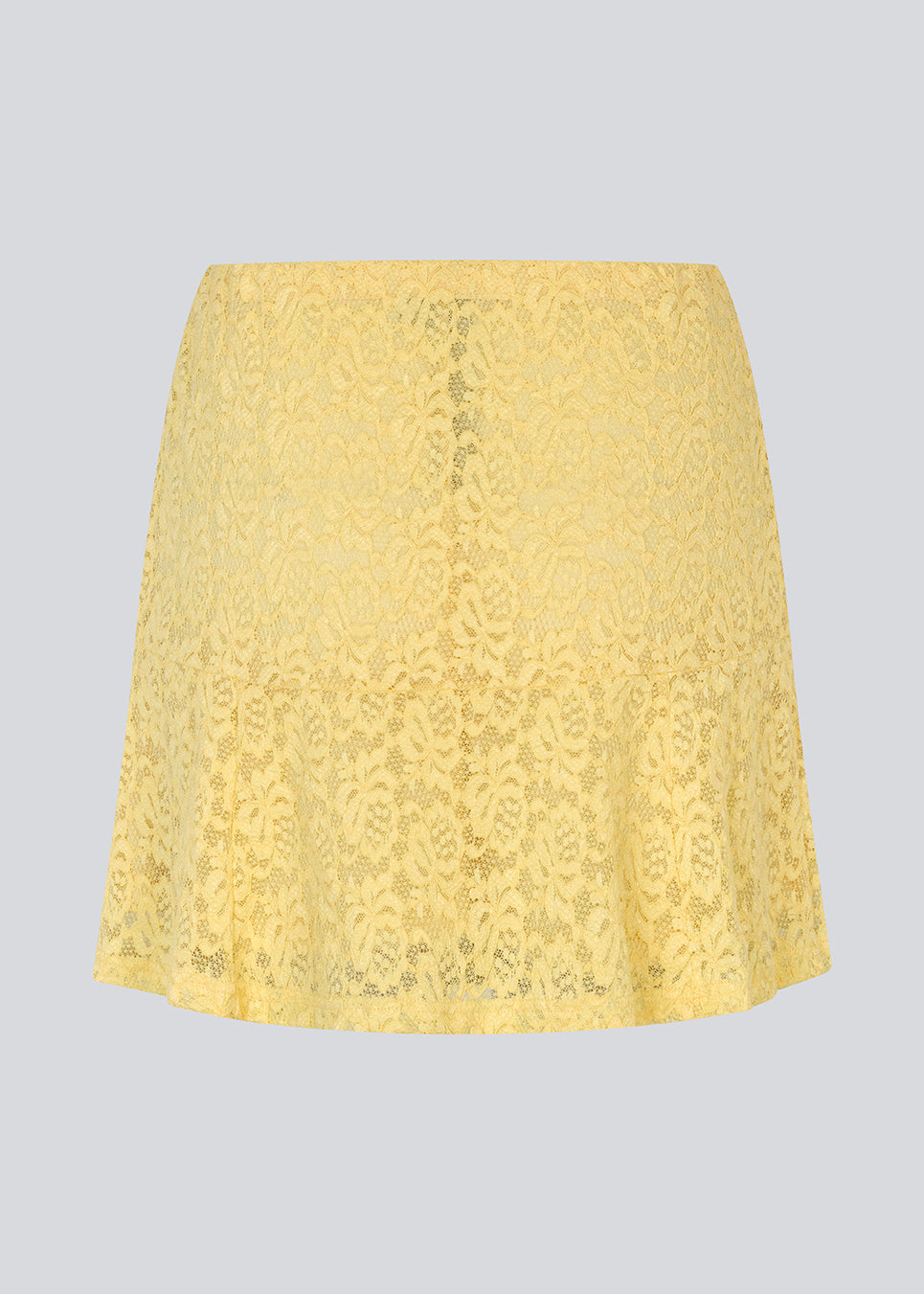 Short lace skirt in yellow wth an a-line. NamumdMD skirt has a lining and an elastic at the waist.
