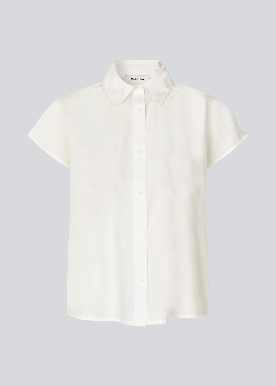 Sleeveless shirt with button closure in front. NanikaMD SS shirt has a loose fit and a shirt collar.&nbsp;