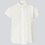 Sleeveless shirt with button closure in front. NanikaMD SS shirt has a loose fit and a shirt collar.&nbsp;