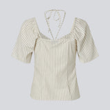 Short-sleeved top with tiedetails in 100% organic cotton. NanikaMD top has a tieband which wraps around the neck, an elastic silicone tape at the
