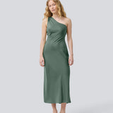 Long one shoulder dress in green in satin. NarcissaMD dress has an open back with beautiful details and an invisible zipper in the side.