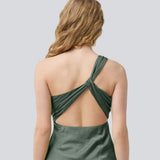 Long one shoulder dress in green in satin. NarcissaMD dress has an open back with beautiful details and an invisible zipper in the side.