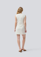 Sleeveless white denim dress in cotton. NadirMD dress is fitted, has a round neck and a zipper in the back.