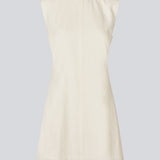 Sleeveless white denim dress in cotton. NadirMD dress is fitted, has a round neck and a zipper in the back.