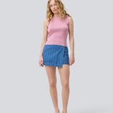 Sleeveless pink top in a shimmery knit. NavalMD top has a round neckline and a deep back.