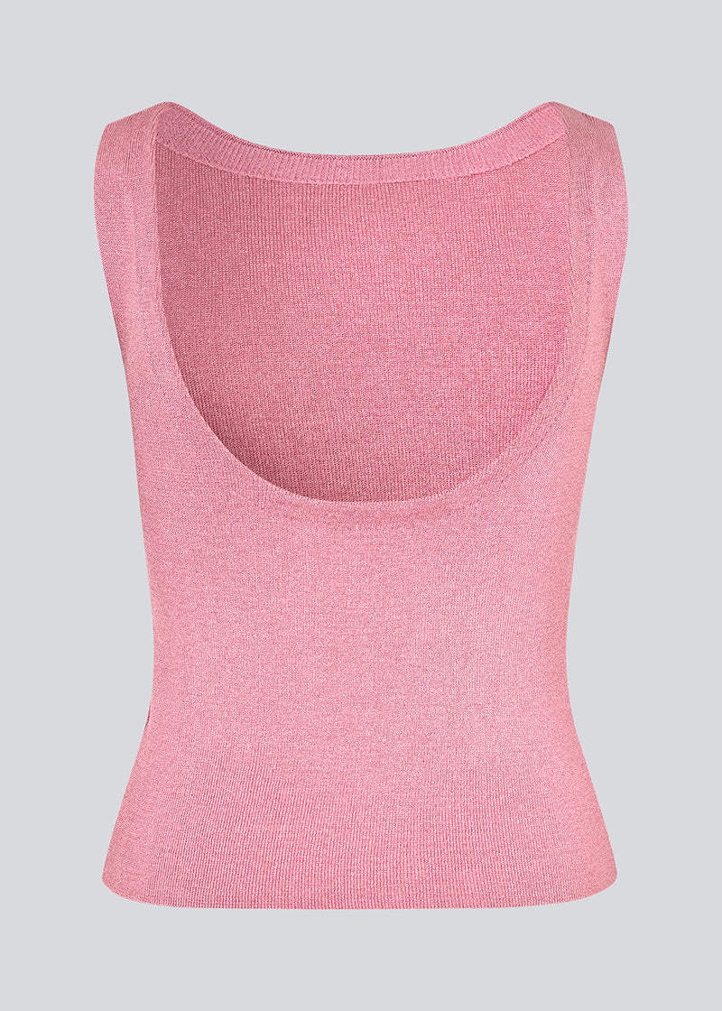 Sleeveless pink top in a shimmery knit. NavalMD top has a round neckline and a deep back.