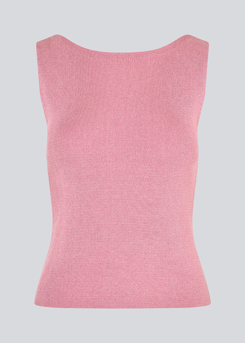 Sleeveless pink top in a shimmery knit. NavalMD top has a round neckline and a deep back.