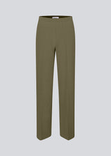 Classic dark green pants with pressfolds and straight legs. Nelli pants are closes by an hidden zipper at the side with an elastic waistband for a more comfortable fit.