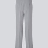 Classic pants in grey with pressfolds and straight legs. Nelli pants are closed by an hidden zipper at the side with an elastic waistband for a more comfortable fit.&nbsp;
