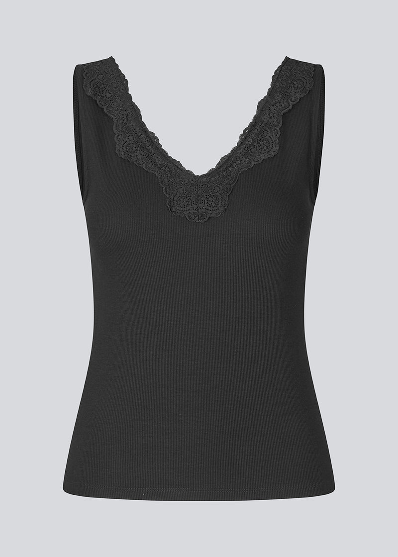 Sleeveless top with a lace in ribbed jersey. NemiMD top is fitted and has a v-neck.