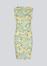Fitted dress in 100% recycled polyester. NettieMD print dress has ruffles on the sleeves and gathers on the side. The dress has a beautiful floral print.