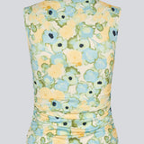 fitted top in an elastic material. NettieMD print top is sleeveless, has a high neckline, and has gatherings in the side