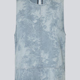 Sleeveless top with a round neck in cotton denim. NaomaMD solid top has a loose fit and an opening in the neck with a button closure.