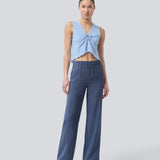 Blue pants with wide legs in EcoVero viscose. NickiMD pants have an elastic waistband and side pockets.
