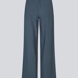 Blue pants with wide legs in EcoVero viscose. NickiMD pants have an elastic waistband and side pockets.