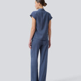 Blue pants with wide legs in EcoVero viscose. NickiMD pants have an elastic waistband and side pockets.