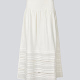 Maxi skirt in white in 100% organic cotton. NillaMD short skirt has a loose skirt with pleats and frill details, and an elastic waist with a smock.