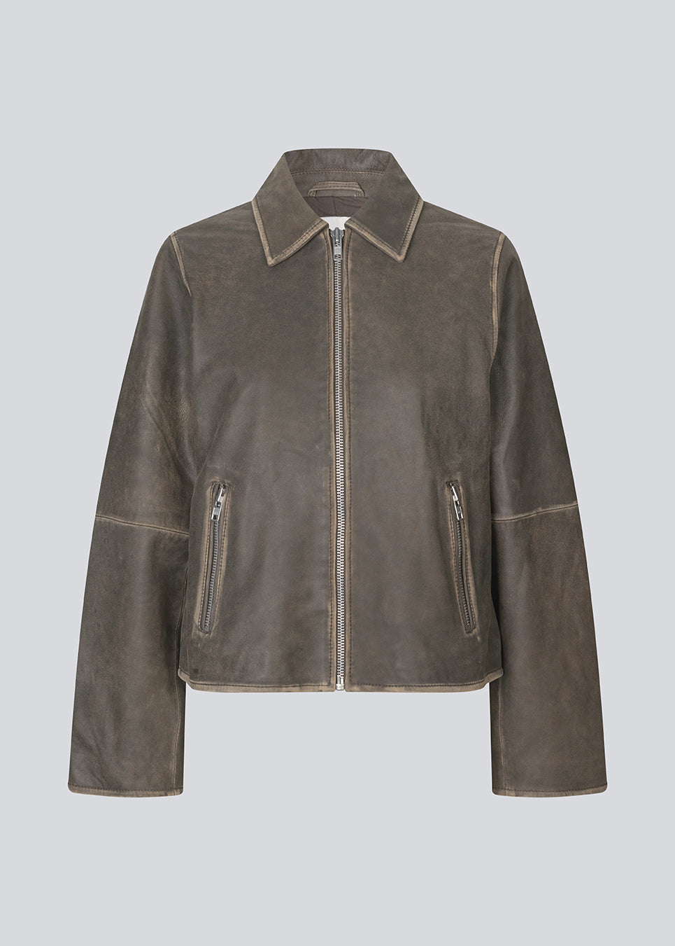 Brown Leather jacket with a loose fit in 100% lamp leather. NimaMD jacket has a zipper closure, shirt collar and two front pockets.