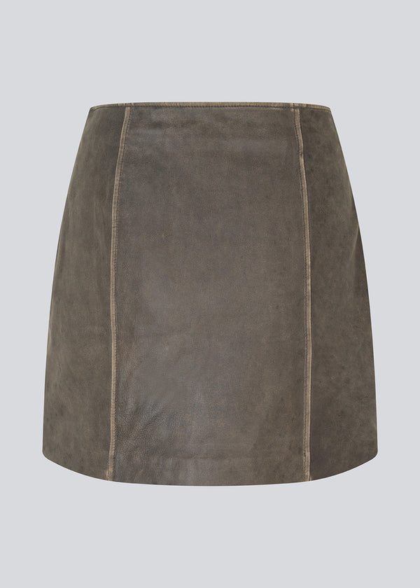 Short A-line leather skirt in lamb leather with a medium-high waist. NimaMD skirt has a vintage-inspired look and a hidden zipper on the side.
