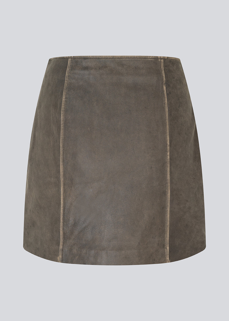 Short A-line leather skirt in lamb leather with a medium-high waist. NimaMD skirt has a vintage-inspired look and a hidden zipper on the side.