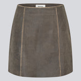 Short A-line leather skirt in lamb leather with a medium-high waist. NimaMD skirt has a vintage-inspired look and a hidden zipper on the side.