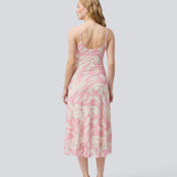 Long dress with thin straps and a waterfall detail at the front. NimraMD print dress is made in a slightly transparent material with lining.