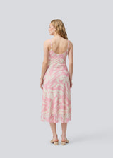 Long dress with thin straps and a waterfall detail at the front. NimraMD print dress is made in a slightly transparent material with lining.