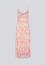 Long dress with thin straps and a waterfall detail at the front. NimraMD print dress is made in a slightly transparent material with lining.