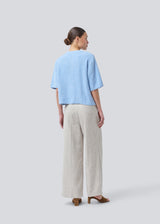 Short-sleeved cardigan in a soft knit. NoeMD cardigan has a loose fit and a button closure in front.