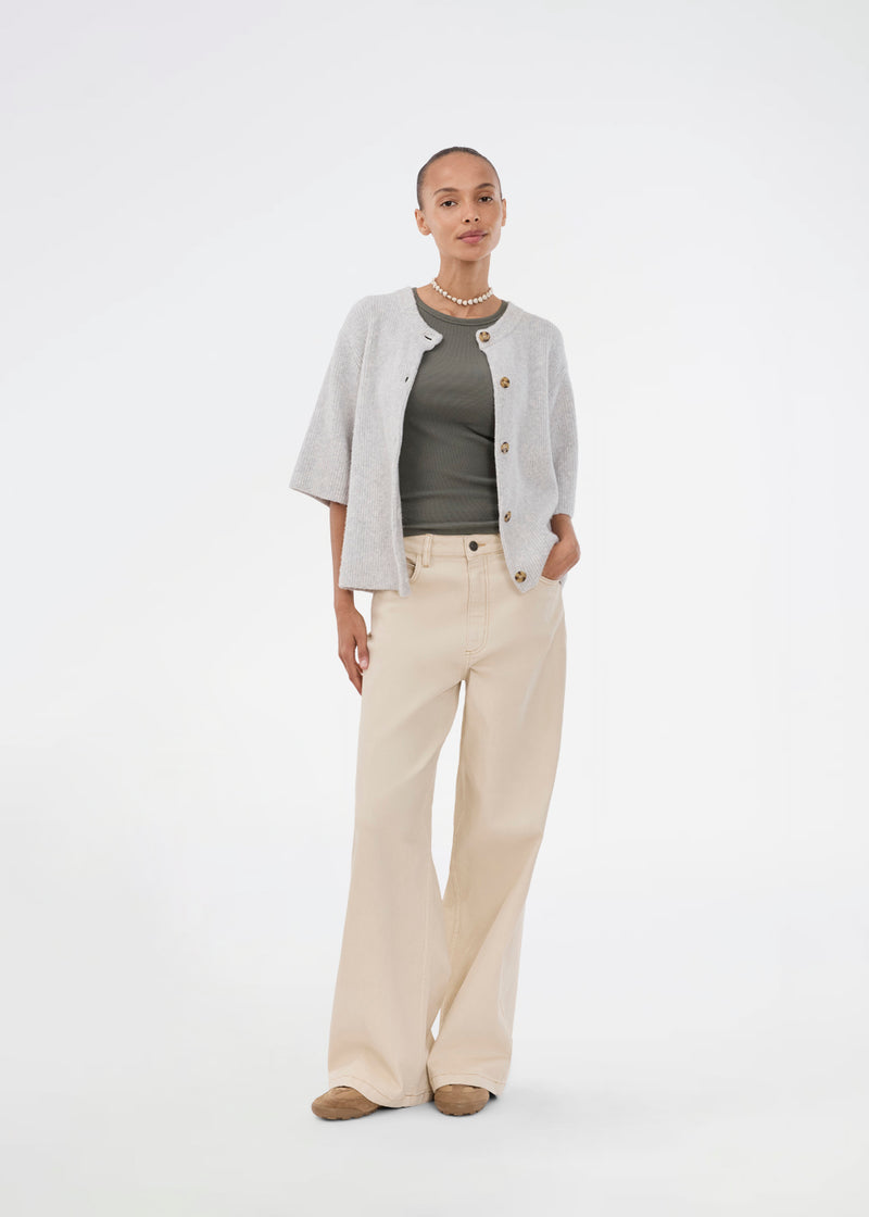 Shortsleeved cardigan in soft knit. NoeMD cardigan has a loose fit and button closure at the front.